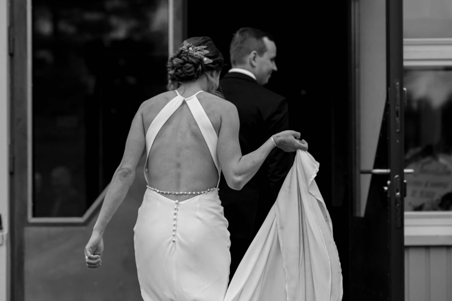 Bride and groom entering the venue